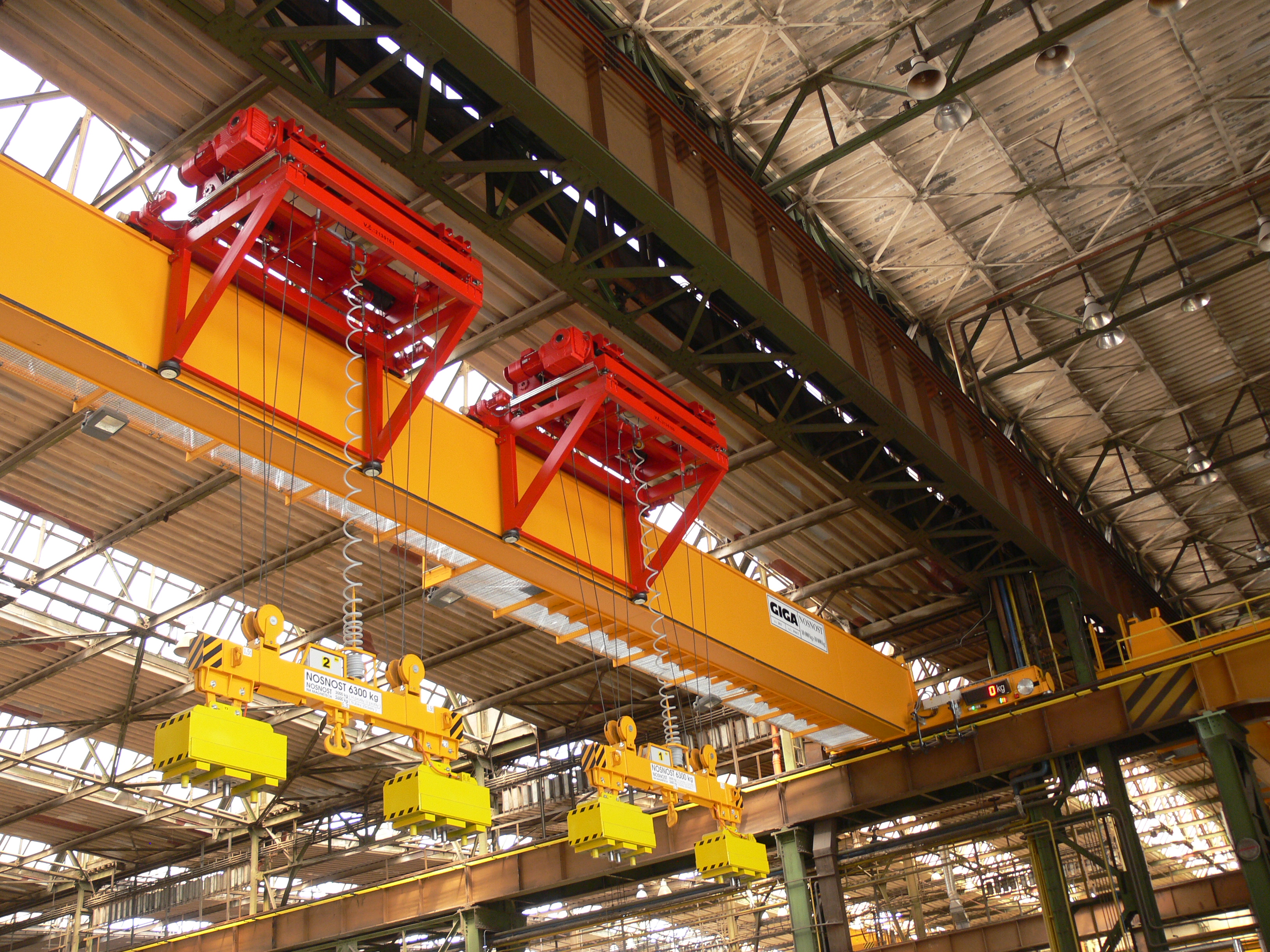 Delivery of special bridge cranes with cantilever hoists for the NYPRO metallurgical storehouse