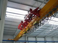 Bridge cranes of GIGA - bridge crane single girder, with two cantilever hoists, with rope stabilization on magnet traverse
